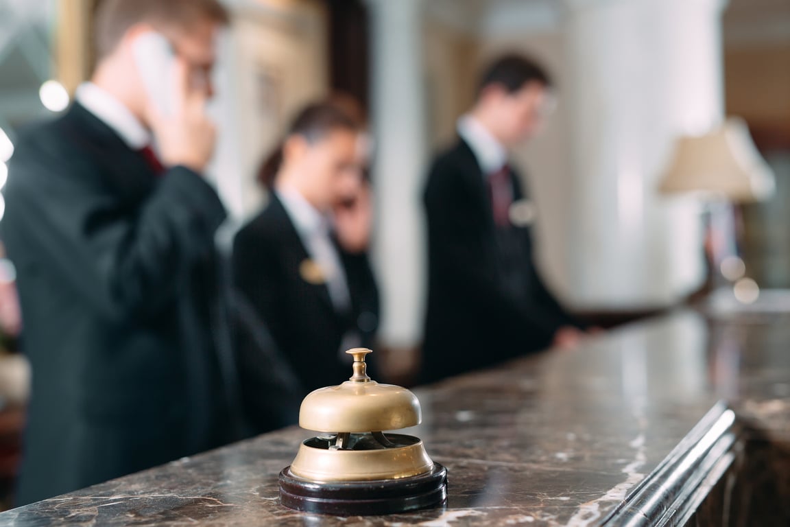 Hotel service bell Concept hotel, travel, room,Modern luxury hotel reception counter desk on background.